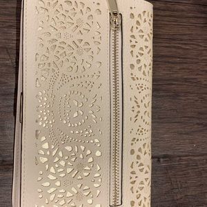 call it spring purse. clutch or crossbody!